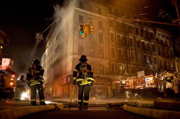 Photograph of firefighters outside the Chinatown blaze